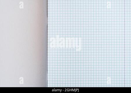 Open squared school notebook, close up view. Copy-space. Stock Photo