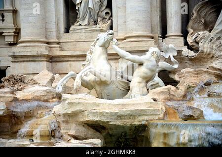 The Trevi Fountain represents Ocean on a chariot pulled by sea horses and tritons. ... The sculptor Nicola Salvi was chosen who began the work Stock Photo