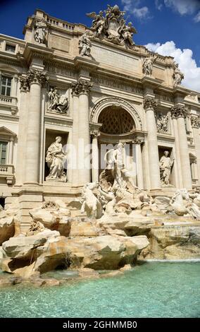 The Trevi Fountain represents Ocean on a chariot pulled by sea horses and tritons. ... The sculptor Nicola Salvi was chosen who began the work Stock Photo