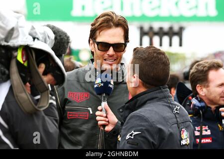 Tom Brady (USA) New England Patriots Quarterback with Will Buxton (GBR) NBC  Sports Network TV Presenter on the grid. 12.06.2016. Formula 1 World  Championship, Rd 7, Canadian Grand Prix, Montreal, Canada, Race Day. Photo  credit should read