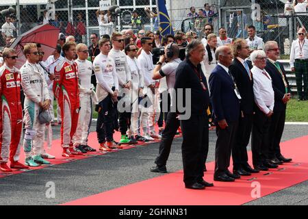 The drives observe the national anthem with Sergio Marchionne (ITA), Ferrari President and CEO of Fiat Chrysler Automobiles; Dr. Angelo Sticchi Damiani (ITA) Aci Csai President, Bernie Ecclestone (GBR); and Roberto Marone (ITA President of Lombardia Region.  04.09.2016. Formula 1 World Championship, Rd 14, Italian Grand Prix, Monza, Italy, Race Day.  Photo credit should read: XPB/Press Association Images. Stock Photo