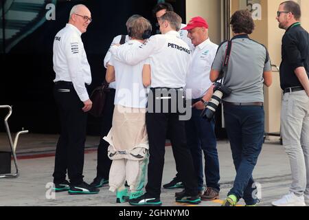 Nico Rosberg (GER) Mercedes AMG F1 with Thomas Weber (GER) Member of the Board of Management of Daimler AG; Niki Lauda (AUT) Mercedes Non-Executive Chairman and Toto Wolff (GER) Mercedes AMG F1 Shareholder and Executive Director.  27.11.2016. Formula 1 World Championship, Rd 21, Abu Dhabi Grand Prix, Yas Marina Circuit, Abu Dhabi, Race Day.  Photo credit should read: XPB/Press Association Images. Stock Photo