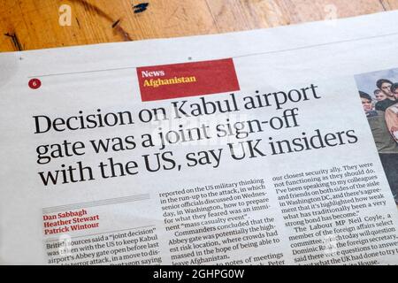 Newspaper headline Guardian Afghanistan news article 'Decision on Kabul airport gate was a joint sign-off with the US' on 21 Sept 2021 London UK Stock Photo