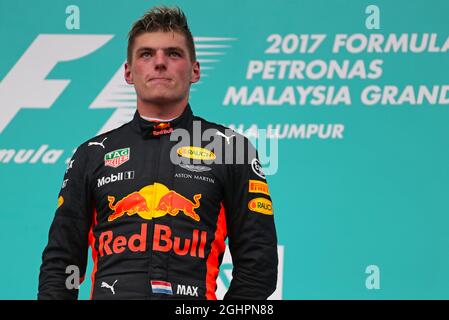 Race winner Max Verstappen (NLD) Red Bull Racing on the podium.  01.10.2017. Formula 1 World Championship, Rd 15, Malaysian Grand Prix, Sepang, Malaysia, Sunday.  Photo credit should read: XPB/Press Association Images. Stock Photo