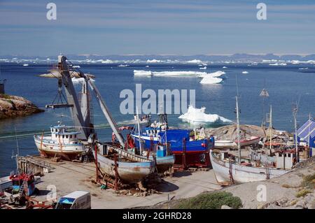 Fishing boats lying on dry land, Ilulissat, Artkis, Greenland, Denmark Stock Photo