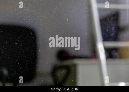 Dust in the room, in the sunlight from the window, in the Stock Photo