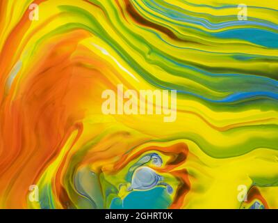 Abstract image of various colors of acrylic paint mixed together using a paint pouring  technique Stock Photo