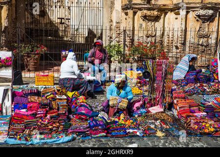 Colourful market in front of destroyed Iglesia de Nuestra Senora del Carmen, Antigua, Antigua, Guatemala Stock Photo