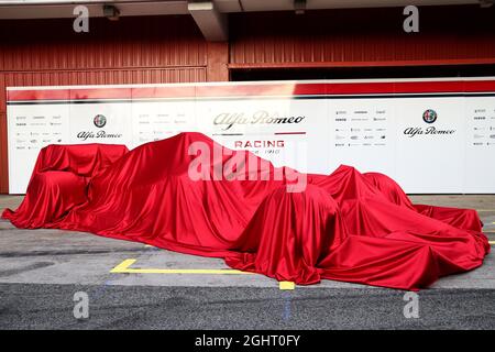 The new Alfa Romeo Racing car under wraps.  18.02.2019. Formula One Testing, Day One, Barcelona, Spain. Monday.  Photo credit should read: XPB/Press Association Images. Stock Photo