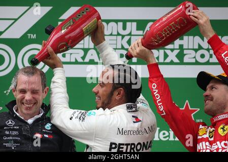 John Owen (GBR) Mercedes AMG F1 Chief Designer celebrates on the podium  with the trophy at Formula One World Championship, Rd10, British Grand  Prix, Race, Silverstone, England, Sunday 10 July 2016.