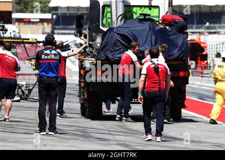 The Alfa Romeo Racing C38 of Callum Ilott (GBR) Alfa Romeo Racing Test Driver is recovered back to the pits on the back of a truck.  14.05.2019. Formula One In Season Testing, Day One, Barcelona, Spain. Tuesday.  Photo credit should read: XPB/Press Association Images. Stock Photo