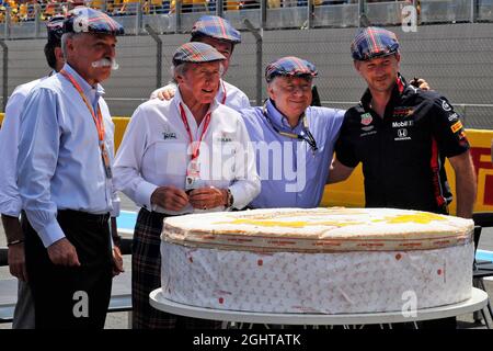 (L to R): Chase Carey (USA) Formula One Group Chairman with Jackie Stewart (GBR), celebrating his 80th birthday; Jean Todt (FRA) FIA President; and Christian Horner (GBR) Red Bull Racing Team Principal.  23.06.2019. Formula 1 World Championship, Rd 8, French Grand Prix, Paul Ricard, France, Race Day.  Photo credit should read: XPB/Press Association Images. Stock Photo