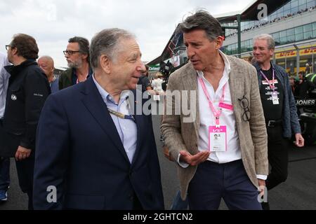 (L to R): Jean Todt (FRA) FIA President with Lord Sebastian Coe (GBR) IAAF President on the grid.  14.07.2019. Formula 1 World Championship, Rd 10, British Grand Prix, Silverstone, England, Race Day.  Photo credit should read: XPB/Press Association Images. Stock Photo