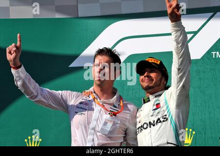 Race winner Lewis Hamilton (GBR) Mercedes AMG F1 celebrates on the podium with James Vowles (GBR) Mercedes AMG F1 Chief Strategist.  04.08.2019. Formula 1 World Championship, Rd 12, Hungarian Grand Prix, Budapest, Hungary, Race Day.  Photo credit should read: XPB/Press Association Images. Stock Photo