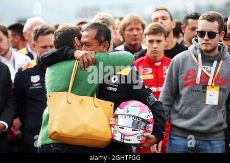 F1, F2, and F3 pay their respects to Anthoine Hubert: Mia Sharizman (MAL) Renault Sport Academy Director with his mother.  01.09.2019. Formula 1 World Championship, Rd 13, Belgian Grand Prix, Spa Francorchamps, Belgium, Race Day.  Photo credit should read: XPB/Press Association Images. Stock Photo