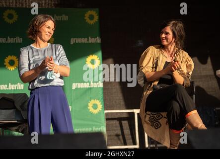 Berlin, Germany. 07th Sep, 2021. Annalena Baerbock (l), candidate for chancellor and party leader of Bündnis 90/Die Grünen, and actress Nora Tschirner speak on stage during an election campaign event of the Bündnis 90/ Die Grünen party. Credit: Christophe Gateau/dpa/Alamy Live News Stock Photo