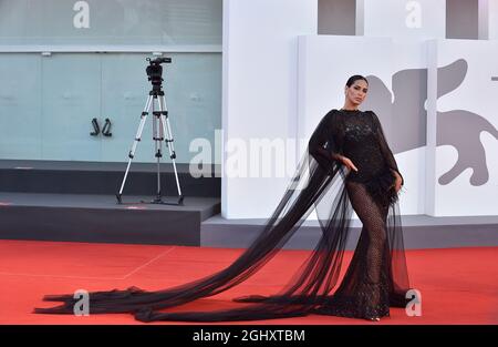 Venice, Italy. 06th Sep, 2021. VENICE, ITALY - SEPTEMBER 06: Guest attend the red carpet of the movie 'La Caja' during the 78th Venice International Film Festival on September 06, 2021 in Venice, Italy. Credit: dpa/Alamy Live News Stock Photo