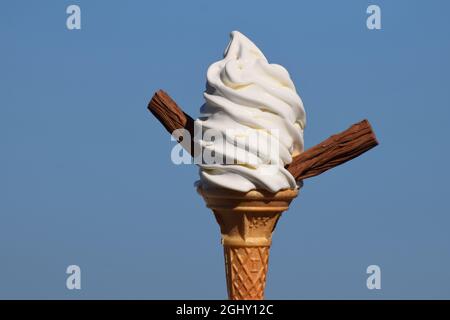 Soft whipped vanilla ice cream in a cone with chocolate flakes. Flake 99. My Whippy. UK. Stock Photo