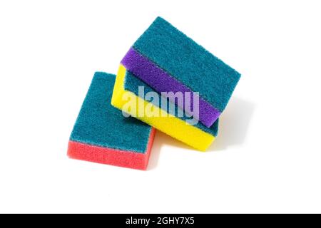 multi-colored sponges for washing dishes on a white background Stock Photo