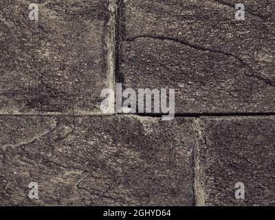 rustic wall made with rough stone bricks Stock Photo
