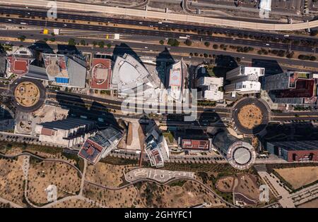 Birds eye view of rooftop of building and skyscrapers with empty street and road in Santa Fe which is the New neighbourhood in Mexico City during day Stock Photo