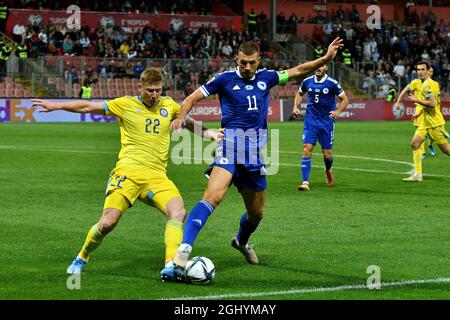 Zenica, Bosnia and Herzegovina (BiH). 7th Sep, 2021. Edin Dzeko (front R) of Bosnia and Herzegovina competes against Aleksandr Marochkin of Kazakhstan during the FIFA World Cup Qualifier match between Bosnia and Herzegovina (BiH) and Kazakhstan in Zenica, Bosnia and Herzegovina (BiH), Sep. 7, 2021. Credit: Nedim Grabovica/Xinhua/Alamy Live News Stock Photo