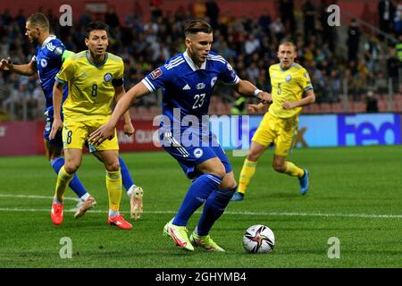 Zenica, Bosnia and Herzegovina (BiH). 7th Sep, 2021. Ermedin Demirovic (front) of Bosnia and Herzegovina dribbles during the FIFA World Cup Qualifier match between Bosnia and Herzegovina (BiH) and Kazakhstan in Zenica, Bosnia and Herzegovina (BiH), Sep. 7, 2021. Credit: Nedim Grabovica/Xinhua/Alamy Live News Stock Photo