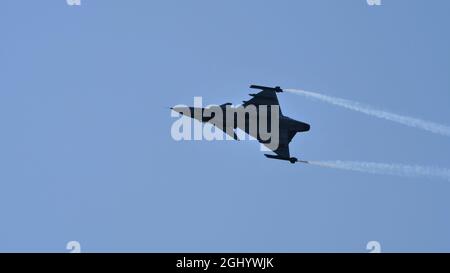 Maribor Slovenia AUGUST, 15, 2021 Aircraft fighter jet black silhouette. SAAB JAS-39 Gripen of Hungarian Air Force Stock Photo