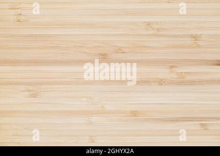 Bamboo board with striped natural wooden pattern, flat background photo texture, frontal view