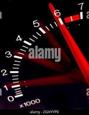 Tachometer - an instrument which measures the working speed of an engine, typically in revolutions per minute. Stock Photo