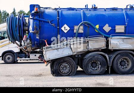 Umea, Norrland Sweden - September 1, 2021: sludge truck where the rear part has broken Stock Photo