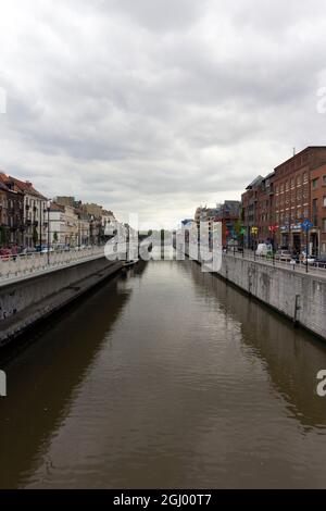 Brussels, Belgium - June 16, 2013: The Brussels Canal in Brussels, Belgium on a cloudy summer day. It is a section of waterway in Belgium. Stock Photo