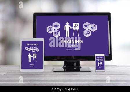Training concept shown on different information technology devices Stock Photo