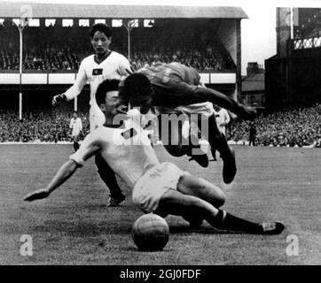 1966 World Cup Portugal v North Korea Portugal's Eusebio is fouled by North Korea's Rim Sun which resulted in a penalty during the World Cup quarter final match at Goodison Park. 23rd July 1966. Stock Photo