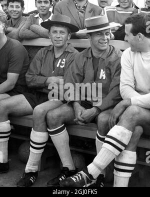 1962 World Cup Smiling footballers Gerry Hitchens (left) and Jimmy Armfield wearing native sombreros at training in Rancagua, Chile in preparation for the World Cup tournament. On the right is Ron Springett (England and Sheffield Wednesday goalkeeper). 28th May 1962. Stock Photo