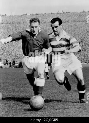 1956 Scottish FA Cup Final Celtic v Hearts at Hampden Park Fernie of Celtic (right) and Kirk of Hearts duel for the ball during the match. A crowd of over 132,000 watched the game and saw Hearts win by 3-1. 23rd April 1956 Stock Photo