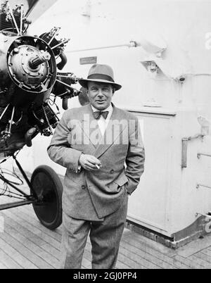 Major Ernst Udet - German aviator stands by his plane arriving in New York enroute to Los Angeles, where he will participate in the National Air Races. 15 June 1933 Stock Photo