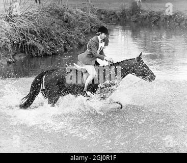 Intrepid Royal horsewoman . Reading, Berkshire : Fording the River Blackwater amidst a cloud of spray is Princess Anne , 15 , as she took part in the Staff College and Sandhurst Hunt's Pony Club Hunter Trials , at Hill Farm at Farley Hill , near Reading on Wednesday . Princess Anne , riding '' Blue Star '' , won the Open event for riders under 21 from a field of forty competitors . 6 April 1966 Stock Photo