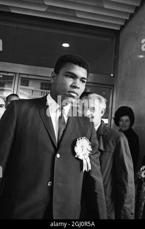 World Champion Football Supporter. 1966 World Cup FinalAmerican World Heavyweight Champion Muhammad Ali ( Cassius Clay) is pictured at the Cumberland Hotel, London, sporting a world cup football rosette. He will be attending the World Cup Tournament Final between England and West Germany at Wembley Stadium later today. The world champion is currently in Britain to defend his title against Britain's Brian London, at Earls Court. 30 July 1966 Stock Photo