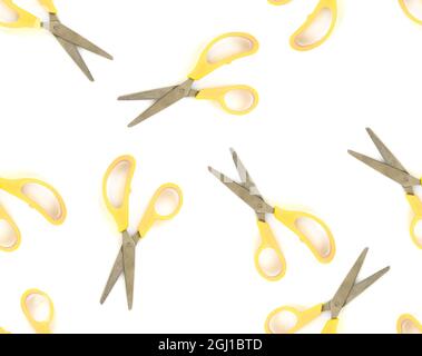 Seamless pattern yellow scissors on white isolated background Stock Photo