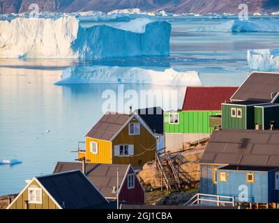 View of fjord full of icebergs towards Nuussuaq peninsula during midnight sun. Stock Photo