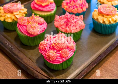 Homemade cupcakes with decorative frosting. Stock Photo