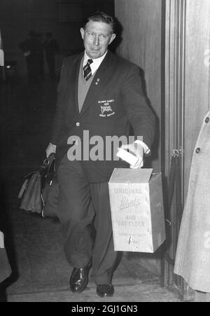 Geoffrey Dyson the athlete and Britain's chief athletics coach at London Airport returning from Germany 16 September 1957 Stock Photo