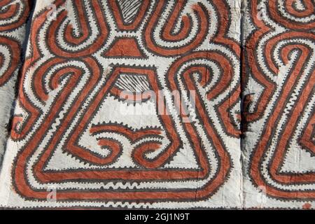 Melanesia, Papua New Guinea, Tufi. Traditional handmade tapa cloth, made from the paper mulberry tree, hand painted with natural dyes using geometric Stock Photo