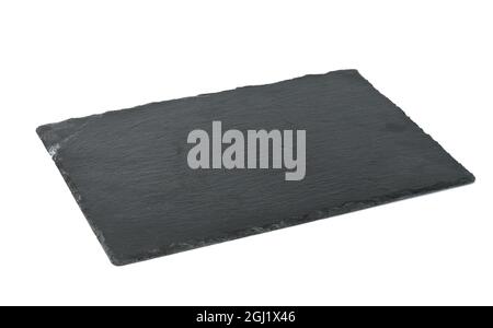 big rectangular black slate stone board isolated on white background, utensils for serving food Stock Photo