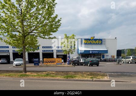 LA FLECHE, FRANCE - Jul 03, 2021: A closeup of the french shop of Norauto a famous brand for repairing Car in France Stock Photo