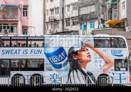 Hong Kong, China. 17th July, 2021. A bus displays a commercial advertisement of the Japanese sports drink manufactured by Otsuka Pharmaceutical, Pocari Sweat, in Hong Kong. (Photo by Budrul Chukrut/SOPA Images/Sipa USA) Credit: Sipa USA/Alamy Live News Stock Photo