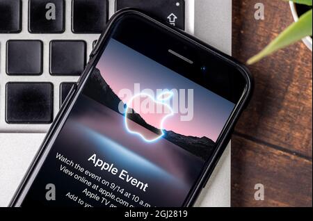 Antalya, Turkey - September 8, 2021: iPhone with Apple event logo 2021 on the screen. Stock Photo