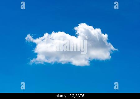 Nature single white cloud on blue sky background in daytime Stock Photo