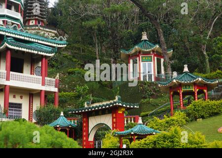 Beautiful view of a Bell Church Baguio in Philippines with rich green nature Stock Photo